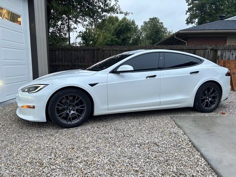 White electric sedan with tinted windows