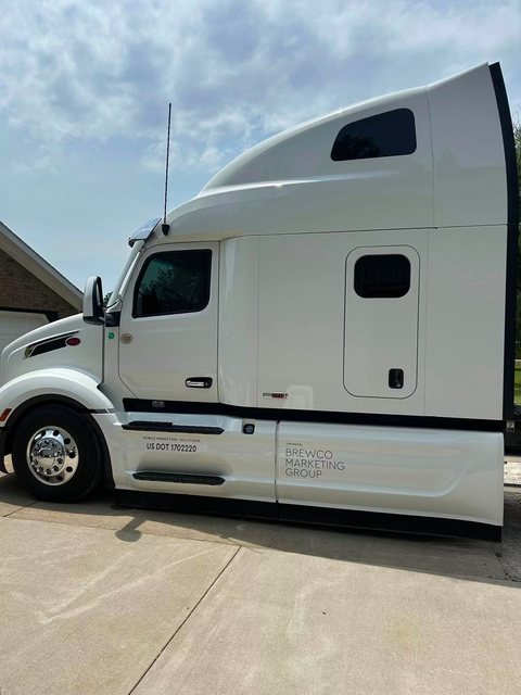 White semi truck sleeper cab with tinted windows